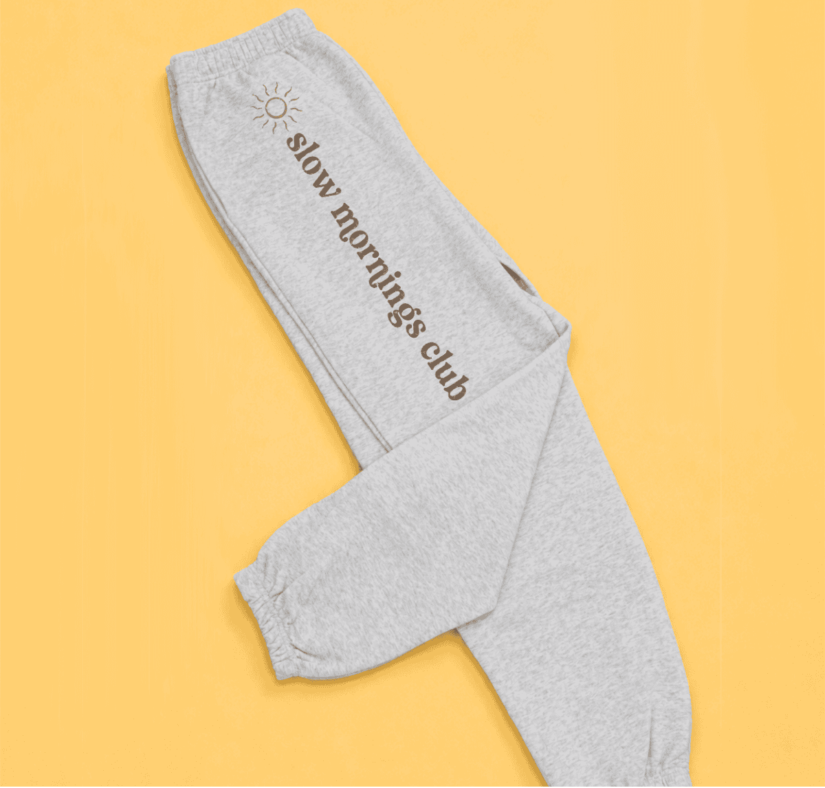 Cotton joggers decorated with a Slow Mornings Club design