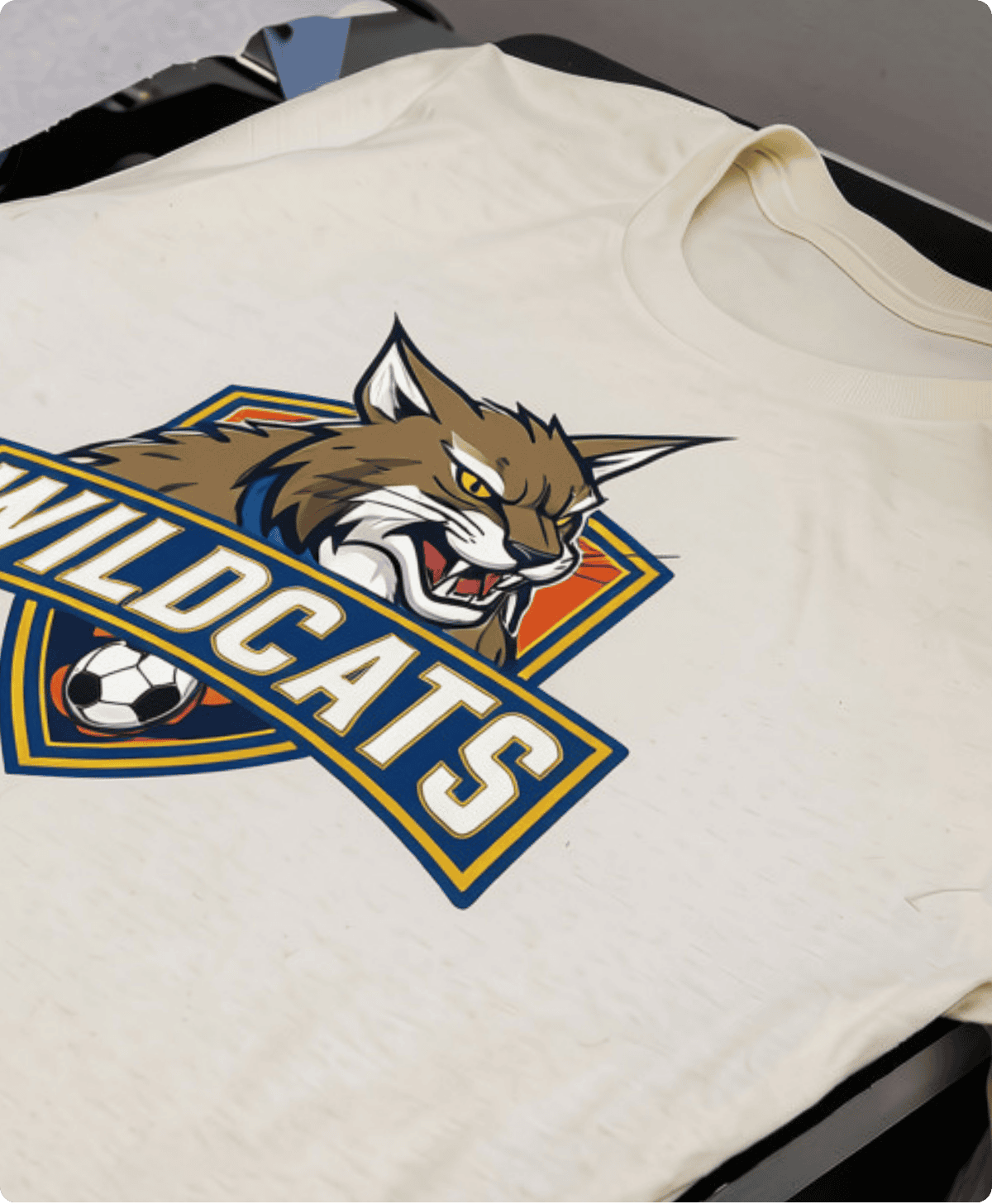 Wildcats design pressed onto a light-colored shirt