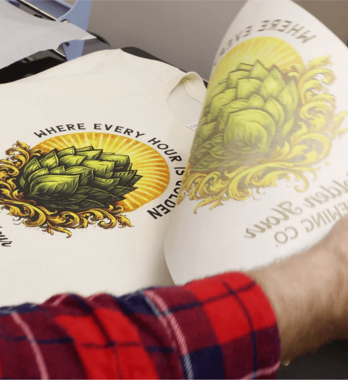 Transfer paper being peeled at a low angle from a shirt