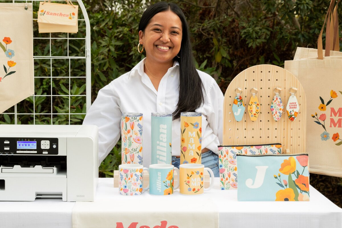 Creator displaying personalized apparel, drinkware and accessories